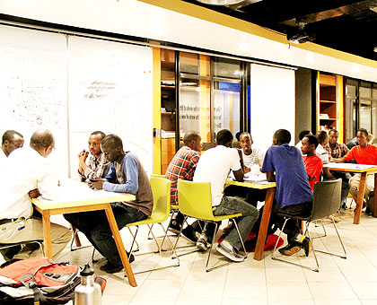 ICT innovators at K-Lab in Kigali busy sharing ideas on how to develop software. The New Times/ File.