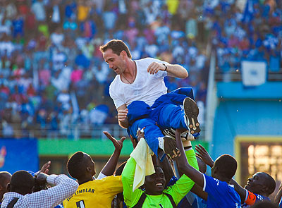 Didier Gomes da Rosa, seen here carried shoulder-high after leading Rayon Sports to last season's league title, the first in nine years. Times Sport / File.