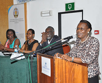 Ugandan IGG Mulyagonja delievers a speech during the EAACA meeting in Kigali yesterday.  It was attended by among others  former Rwandan Ombudsman Senator Tito Rutaremara (2R), Ombudsman Cyanzaire (2L) and the Minister in the Office of the President,  Venantia Tugireyezu (L).  The New Times/ Courtsey photo. 