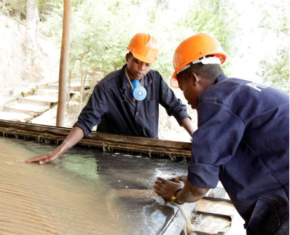 Miners at the coltan mining facility in Mutobwe. The New Times/File