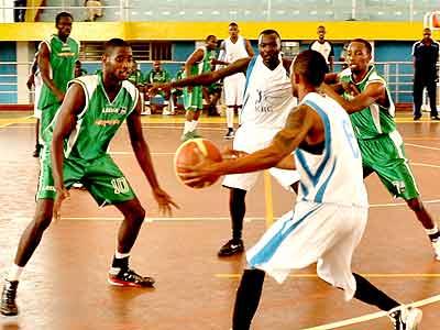 Kigali Basketball Club's Patrick Buzangu (6) tries to pass to a team mate during Game Four of the playoffs against Espoir. Sunday Sport/Plaisir Muzeogeye