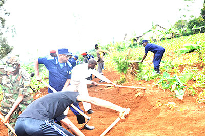 Police and youths during the weekend special Umuganda. The New Times/ Courtesy.