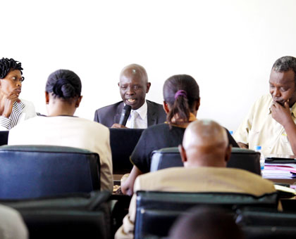 PAC officials (in the back row) examine officials from the Rwanda Development Board recently. The New Times/ Timothy Kisambira.