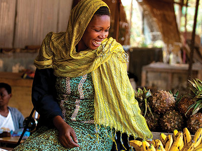 One of the ladies sells bananas. The New Times/Timothy Kisambira