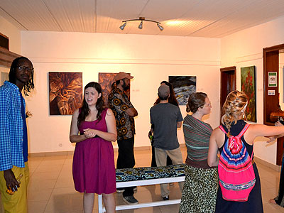 Innocent Nkurunziza (far left) explains to guests during one of his art exhibitions at Inema Art Centre, in Kigali. The New Times/File