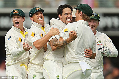 Johnson (middle) laps up the acclaim of his team-mates during his innings-defining burst. Net photo.