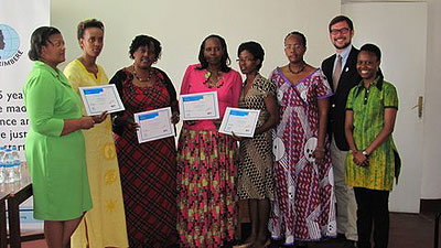 The trainees pose with their certificates after the course. The New Times / Ivan Ngoboka