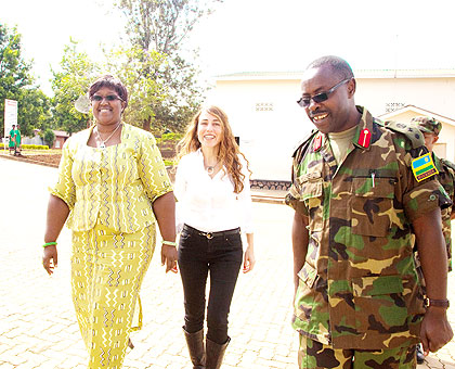 Dr Binagwaho (L) and Fuerst and Col. Dr. Ben Karenzi, the head of Rwanda Military Hospital, Kanombe, at rollout of the PrePex circumcision method yesterday. The New Times/ T. Kisambira.