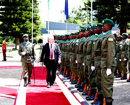 The Head of European Union Delegation to Rwanda, Amb. Michael Ryan, inspects a guard of honour at Village Urugwiro in Kigali yesterday. Seven envoys presented their credentials to President Kagame and pledged to further economic ties with Rwanda.  The New Times/ Village Urugwiro.