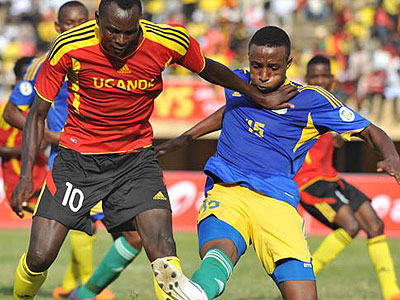 Amavubi defender Emery Bayisenge seen here trying to stop Cranes striker Joseph Mpande. He will be at task in stopping Eritreans as Amavubi plot for a must-win today in Nakuru. The New Times/Courtesy