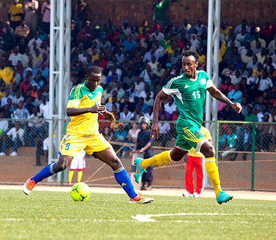 Striker Michel Ndahinduka seen against two Ethiopia defenders in a past CHAN Qualifier scored the all important goal as Rwanda edged past Eritrea to reach the last eight of the GoTv Cecafa Challenge Cup yesterday in Machakos County in Kenya. The New Times/ Courtesy.   The New Times/ Courtesy.