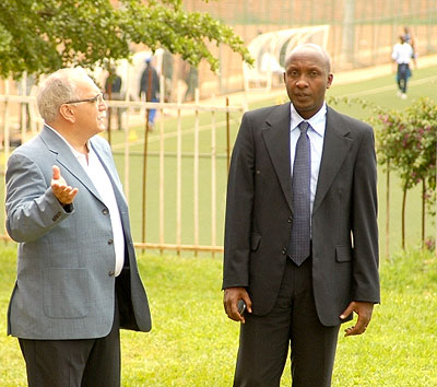 Ferwafa chairman Celestin Ntagungira and Fifa's Dr Yacine Zerguini at the federation's headquarters. The New Times/Courtesy