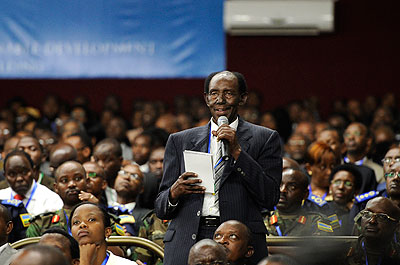 A participant asks a question during u2018Umushyikiranou2019  2013 yesterday. The New Times  / Courtesy.