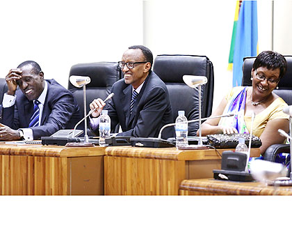 President Kagame makes a point at the Umushyikirano as Speaker Donatile Mukabarisa (R) and Senate president Jean Damascene Ntawukuriryayo look on. The New Times/ Village Urugwiro.