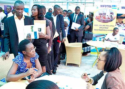 Job seekers meet potential employers. Employers in public sector have been urged to train their staff. The New Times/ File.
