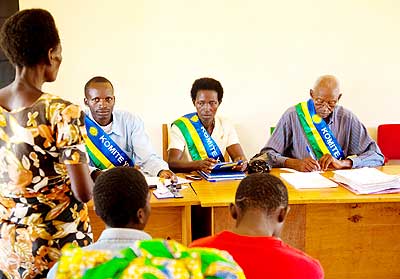 Local mediators hear a case. New law reform seeks to give the Abunzi more mandate. The New Times/ File.
