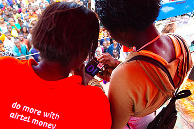 Ladies at the launch of Airtel Money. Business Times / Timothy Kisambira.