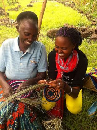 Ingabire (right) with Beleta Ntawangakaje weaving a basket. The New Times/Courtesy