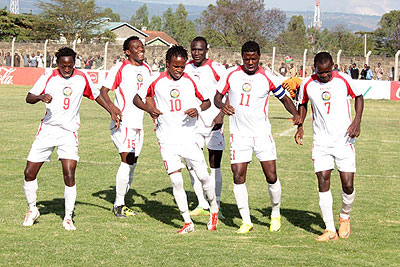 Harambee Stars celebrate a recent win in the GOtv Cecafa Cup 2013 in Nakuru.Wanga (wearing arm-band) scored both goals in the final yesterday. Net photo.