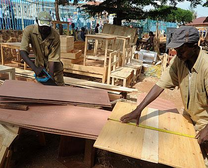 Carpenters make furniture. Urwego Opportunity Bank has unveiled a loan financing package worth Rwf 2.5b that will be channelled to SMEs. Net photo.