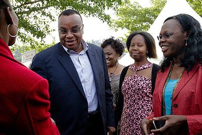Kenyan High Commissioner to Rwanda John Mwangemi greets guests at the event. The New Times / Timothy Kisambira