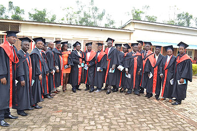 Some of the graduates pose for a group photo. Education Times/ Susan Babijja.