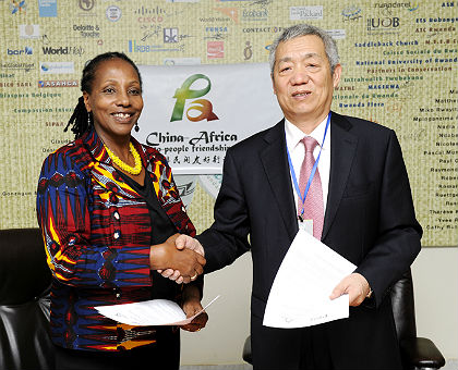 L-R Mrs. Radegonde Ndejuru, DG Imbuto Foundation and HE Ambassador to China Shen Yongxiang during the MoU signing which took place at Imbuto Foundation. The New Times/Courtesy
