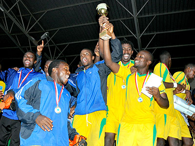 AS Kigali captain Jimmy Mbaraga (left) leads his teammates in celebrations after winning the inaugural Super Cup. Times Sport/File