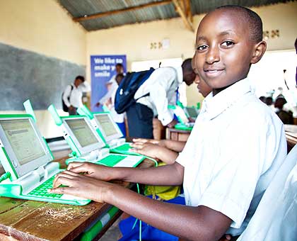 A pupil of Kimisagara school uses laptop. The laptop project is changing the face of education sector in the country.   The New Times/ File.