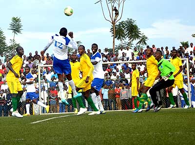 Meddy Kagere , scorer of Rayon Sportsu2019 first goal, jumps highest to beat AS Kigali defence. Times Sport/Samuel Ngendahimana.