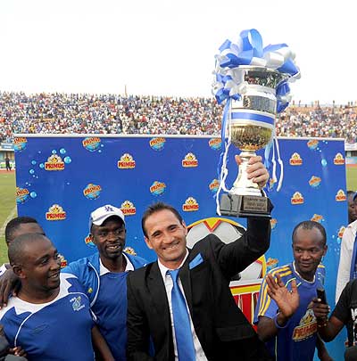 Rayon Sports' French coach Didier Gomes da Rosa lifts the league trophy last season. Times Sport/ T. Kisambira.