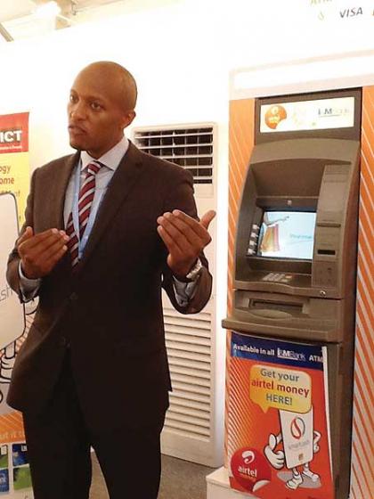 RSwitch boss Konde Bugingo speaks at an event to announce the firmu2019s partnership with Airtel money recently. The New Times / Peterson Tumwebaze