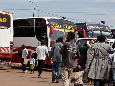 Jaguar and Horizon buses at Nyabugogo wait for passengers. The New Times/Timothy Kisambira