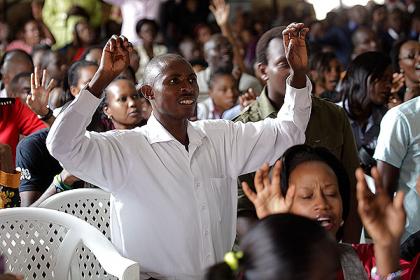 Faithfuls at Restoration Church, Remera, during Christmas mass. The New Times/Timothy Kisambira