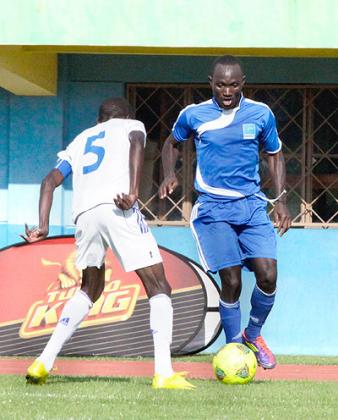 Cedric Amissi  (R)  scored three times as Rayon shot to the League summit.  The New Times / Timothy Kisambira. 