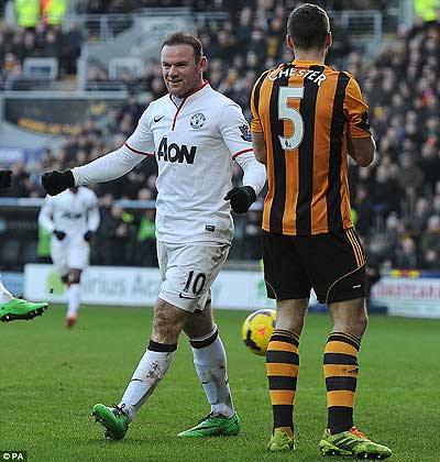 Wayne Rooney celebrates after James Chester (right) scores an own goal to hand United victory. Net photo