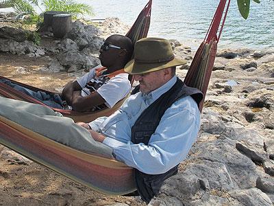 These two relax in Gisenyi. The New Times/Timothy Kisambira