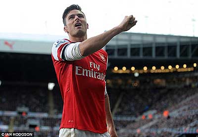 Olivier Giroud celebrates after scoring a header to put Arsenal in the lead. Net photo.