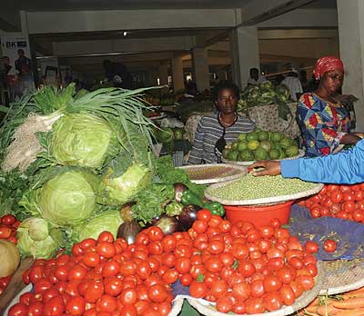 Prices of vegetables like cabbage and tomatoes are stable despite festive season. The New Times / IFile
