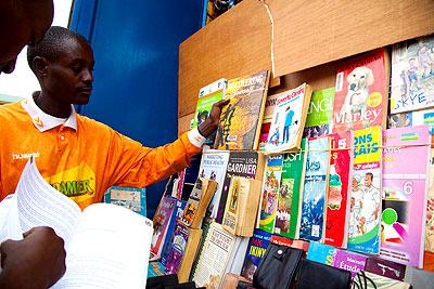 A street vendor at his text books stall at Nyabugogo taxi park. Education Times/ File.