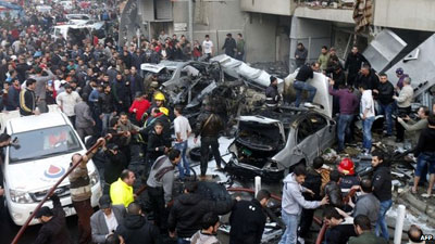 The bomb destroyed a building's facade and several cars. Net photo.