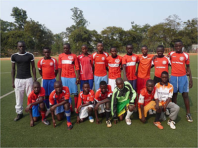 Fabrice Ndayisaba (left) with one of his teams. Saturday Sport / Courtesy