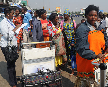 A group of returnees from Malawi on arrival at Kigali International Airport.  The New Times/  John Mbanda.
