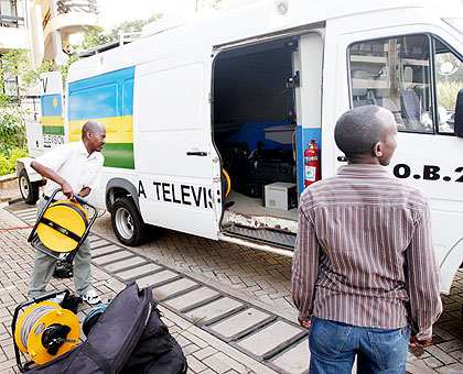 Rwanda Television crew pack  broadcast equipment on to outside broadcasting van. Analogue transmission ends in July.   The New Times/ John Mbanda.
