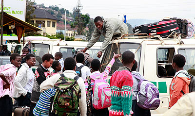 Students heading back to school recently. Education Times / T. Kisambira