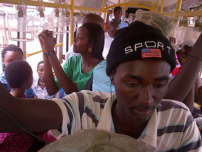 A Kanombe-bound KBS bus crammed with commuters on December 13, 2013. Regulators have warned bus owners and operators against overloading. The New Times/James Munyaneza.