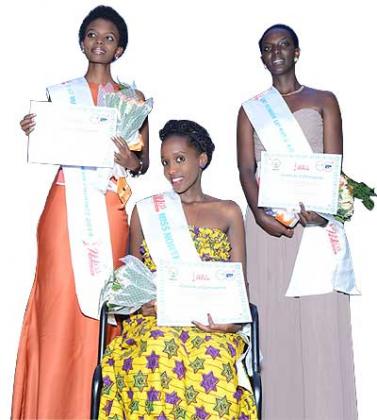 The winner Isimbi flanked by the 1st runner up Mutoniwase (Left) and 2nd runner up Agasaro.