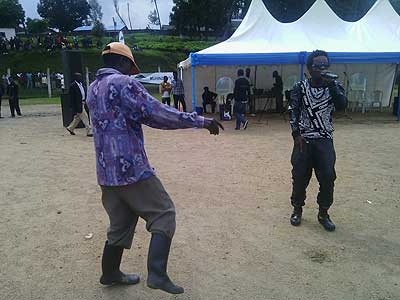 A fan dances along with Jay Polly in Kitabi. The New Times /Sarah Kwihangana.