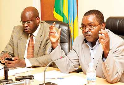 Vincent Munyeshyaka (R) with Deputy CEO, Rwanda Governance Board, Felicien Usengumukiza at the meeting yesterday. The New Times/ J.Mbanda