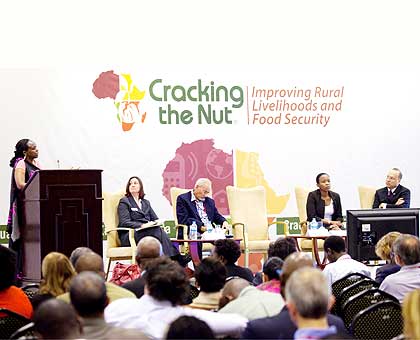 Agriculture minister Agnes Kalibata (L) addresses the Cracking the Nut conference as panelists Anita Campion, an economist; Mike de Klerk of Making Finance Work For Africa; RDBu2019s Claire Akamanzi  and Usaid Country Director Peter Malnak look on in Kigali yesterday. The minister said investors are the way to go for agriculture sector.   The New Times/ Timothy Kisambira.